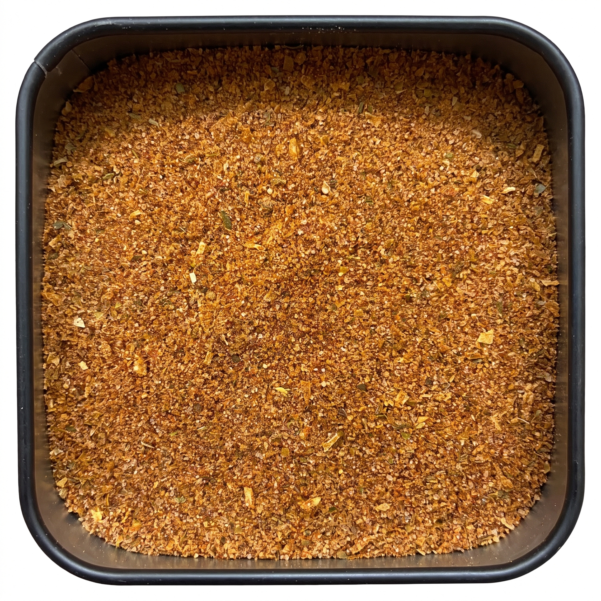 Taco-Gewürzmischung, orange-braunes Pulver mit Kräuterflocken, in schwarzer Gewürzdose, mexikanisch-würzig