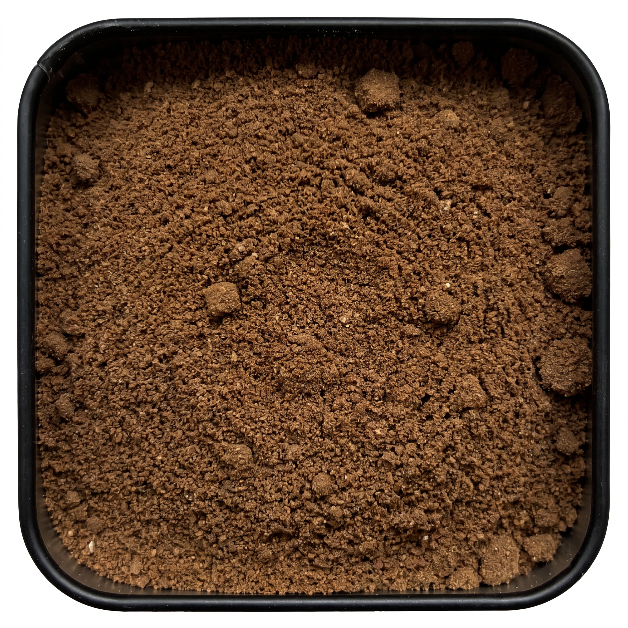 Arabischer Kaffeegenuss, feines braunes Gewürzpulver mit Kardamom und Zimt, in schwarzer Gewürzdose