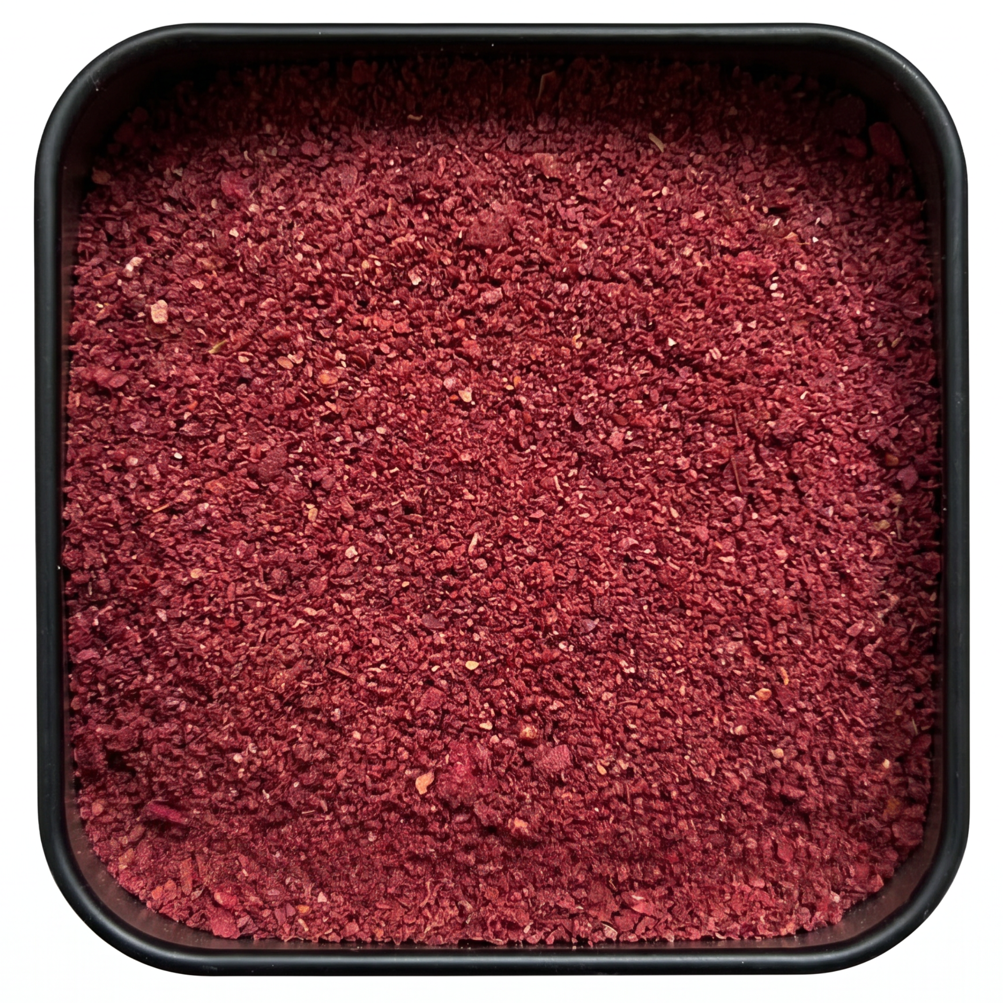 Purpur Curry, kräftig dunkelrotes Currypulver aus Hibiskus und Gewürzen, in schwarzer Gewürzdose