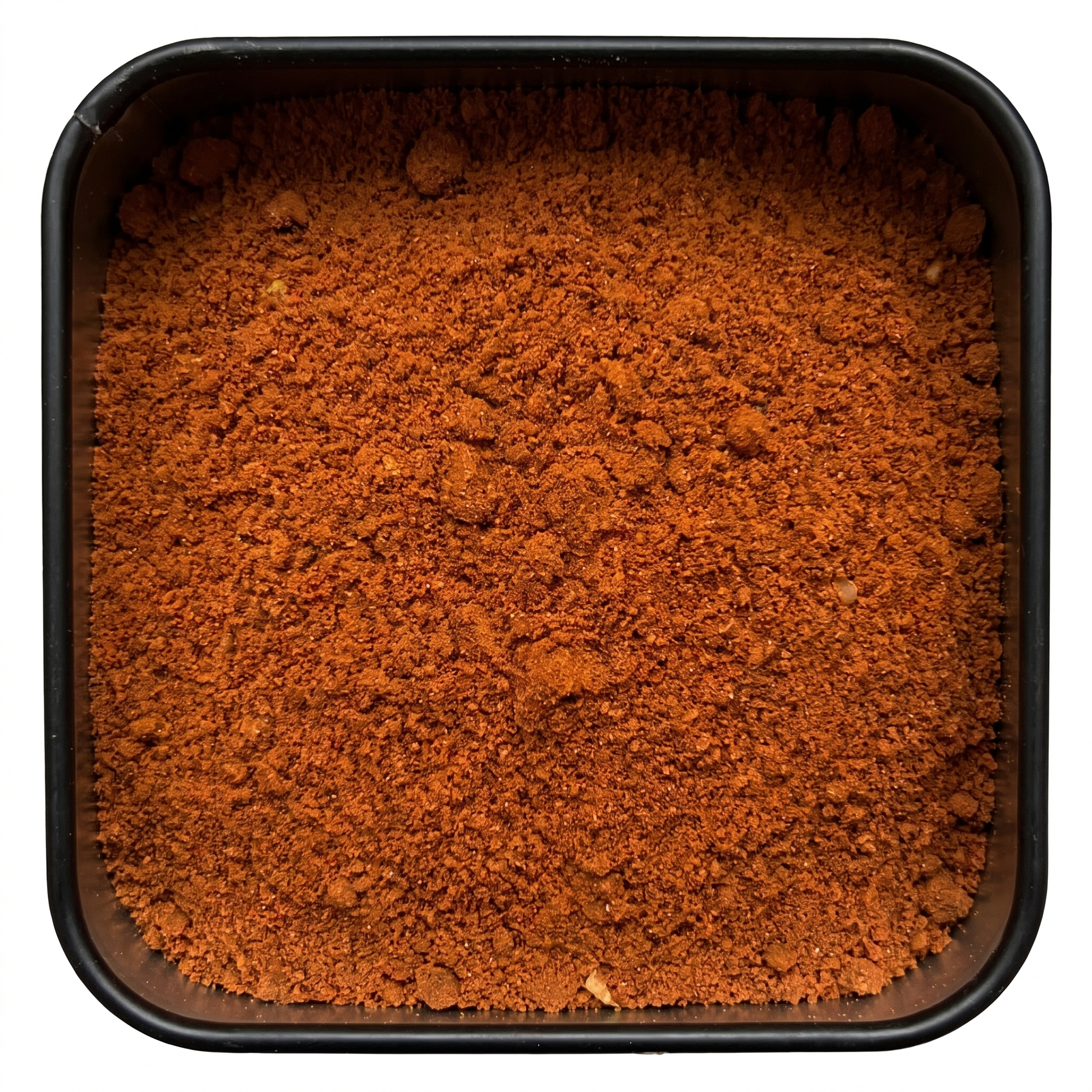 Berbere, kräftig rot-oranges Chilipulver, in schwarzer Gewürzdose, würzig-scharfes Aroma