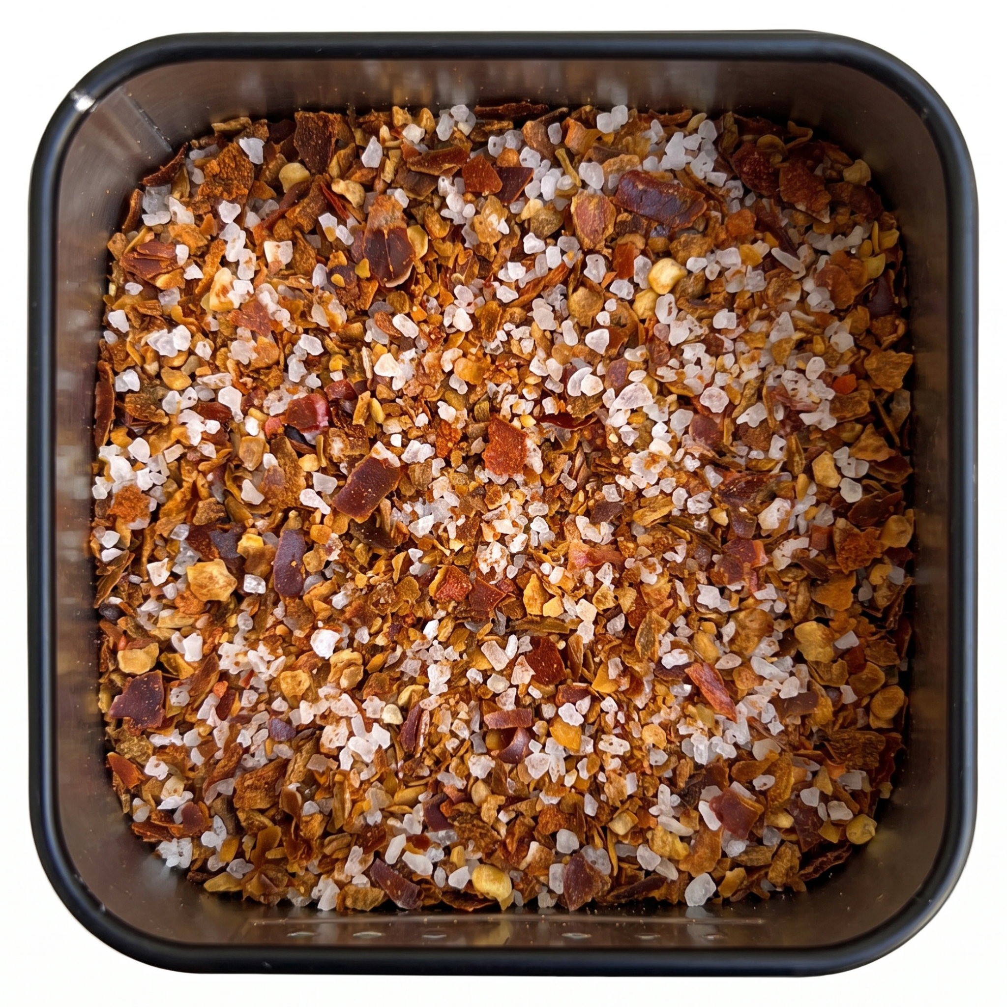 Sal de Ibiza con Chili, grobes Meersalz mit Chiliflocken, in schwarzer Gewürzdose, pikant-mediterran.