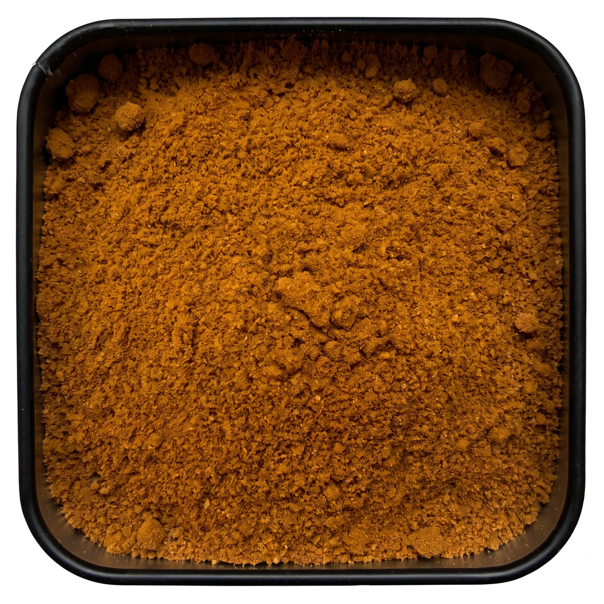 Thai-Gewürzmischung, kräftig orange-braunes Currypulver, in schwarzer Gewürzdose, exotisch-würzig.