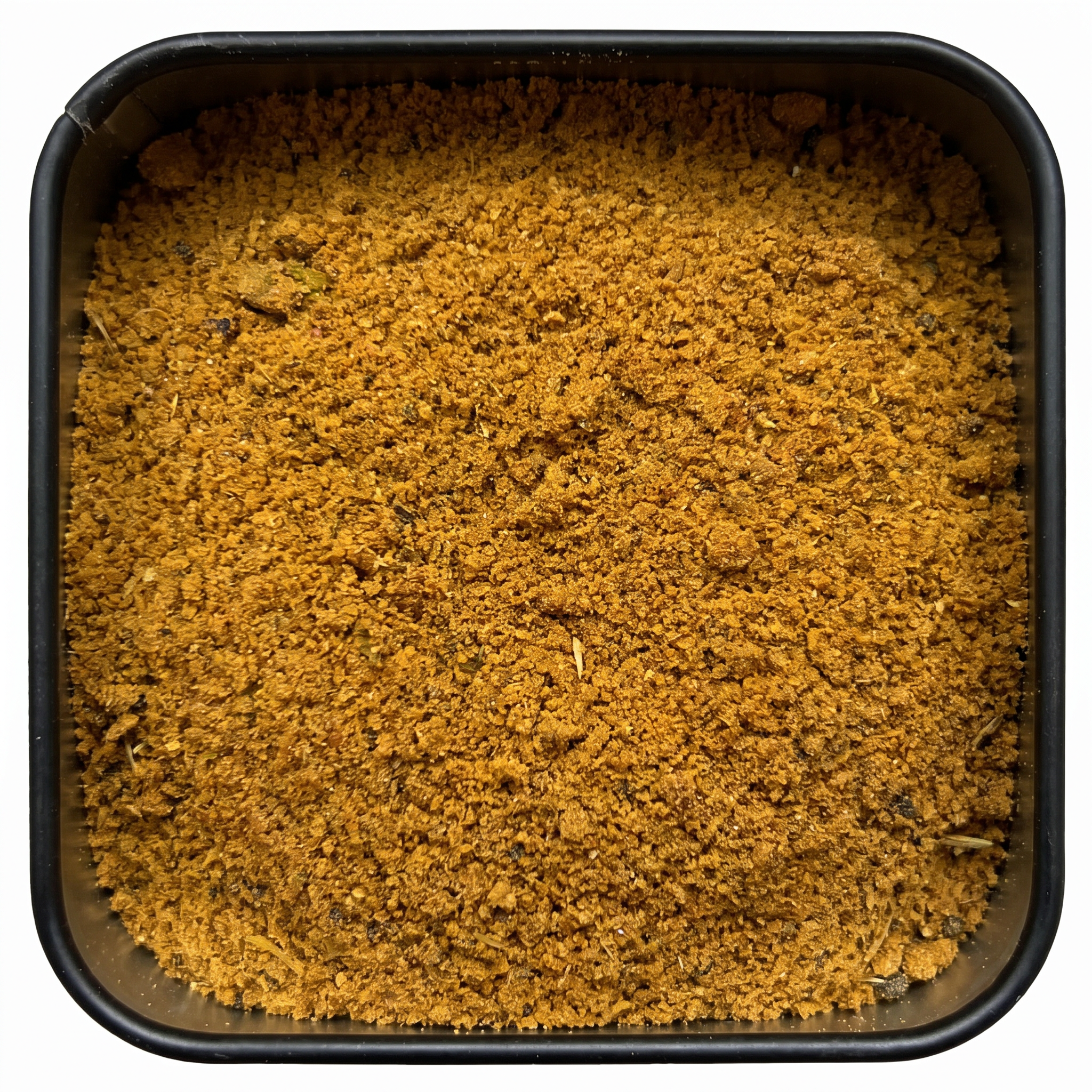 Biryani Masala, kräftig gelb-oranges Currypulver, in schwarzer Gewürzdose, warm-würziges Aroma.